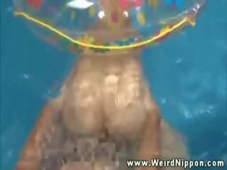 Asian enchantress getting pussy pounded in pool and loves it